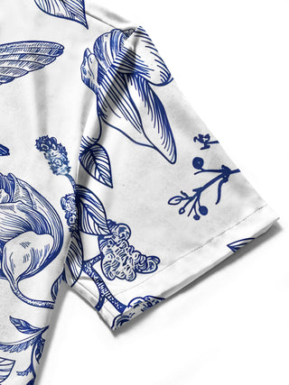 Men's short sleeve shirt close-up detail of bird floral print