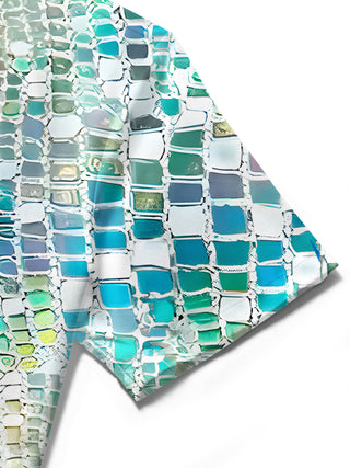 Men wearing short sleeve geometric print shirt in casual lifestyle setting