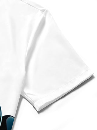 Men in a sports print bowling short sleeve shirt lifestyle photo