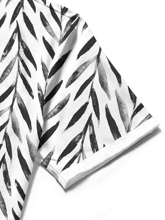Men's resort wear patterned short sleeve shirt close-up detail view