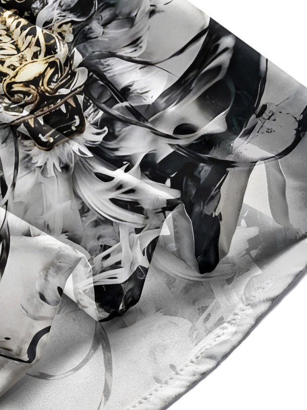 Men's dragon print short sleeve shirt worn casually in urban setting