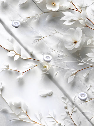 Men's blue floral short sleeve shirt close-up detail view