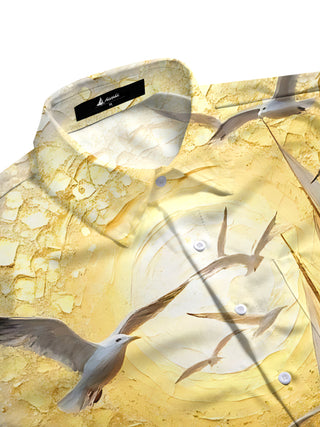 Men's short sleeve shirt side view with gold wave sunset sailboat print