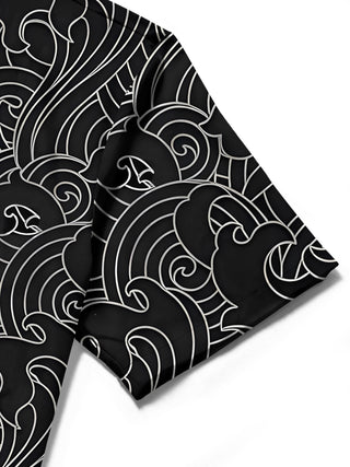 Men's abstract print short sleeve shirt detail close-up fabric stitching