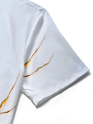 Men's abstract face print short sleeve shirt close-up detail of stitching