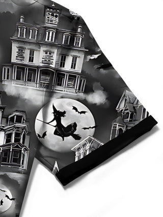 Men's black short sleeve shirt with haunted house detail, close-up view