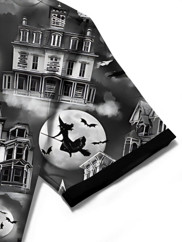 Men's black short sleeve shirt with haunted house detail, close-up view
