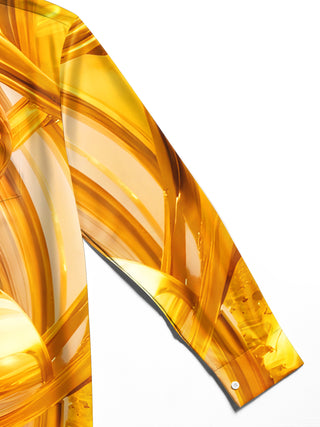 Men's long sleeve shirt with abstract golden geometric print, close-up detail view