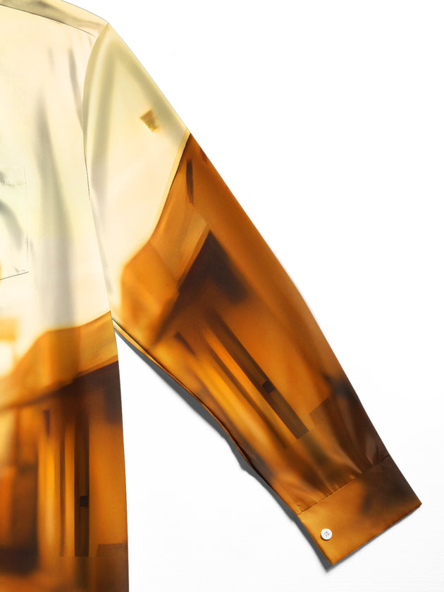 Men's green chameleon print long sleeve shirt close-up detail view