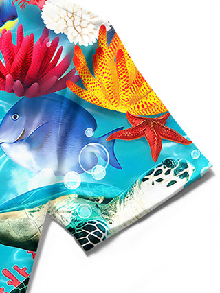 Men's Hawaiian fish print short sleeve shirt close-up detail showing fabric texture and pocket stitching