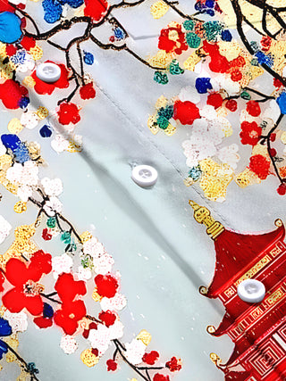 Men's floral short sleeve shirt flat lay emphasizing pattern details