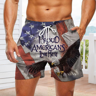 Men casual American flag print board shorts lifestyle view for Independence Day beach scene