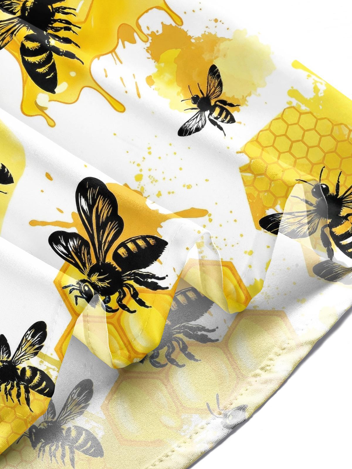 Men's bee print short sleeve shirt worn in lifestyle setting