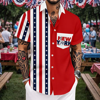 Men's short sleeve Hawaiian American flag print shirt at a beachside Independence Day fireworks show