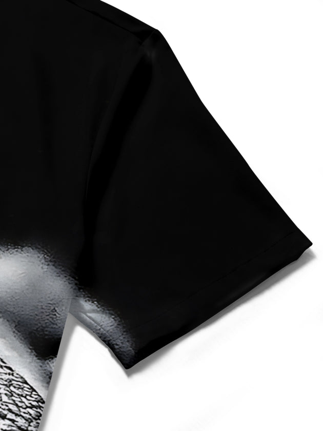Close-up detail of men's dog nose print short sleeve shirt fabric texture