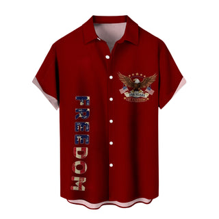 Men in red Hawaiian American flag short sleeve button up shirt watching fireworks on Independence Day