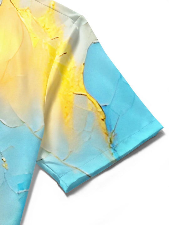 Men's blue short sleeve shirt detail close-up of golden lighthouse mountain pattern