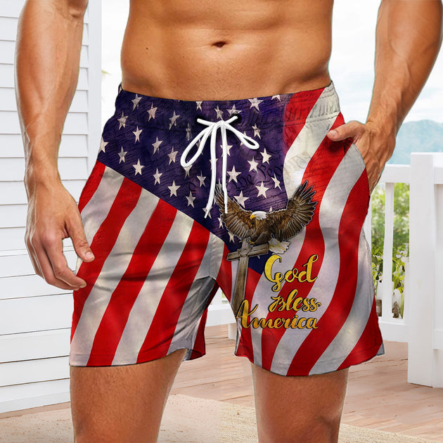 Men red white blue American flag print casual shorts at backyard barbecue for Independence Day lifestyle scene