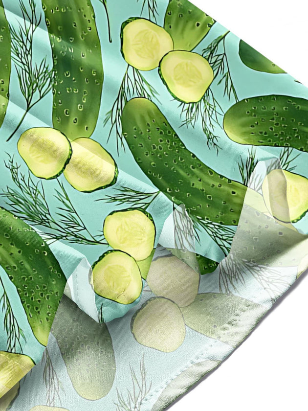Men's cucumber print pocket short sleeve shirt lifestyle shot in garden