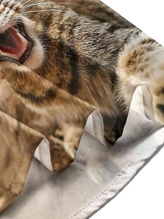 Men's cat dinosaur print short sleeve shirt close-up detail view