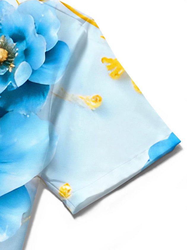 Men's blue floral short sleeve shirt detail close-up emphasizing fabric texture