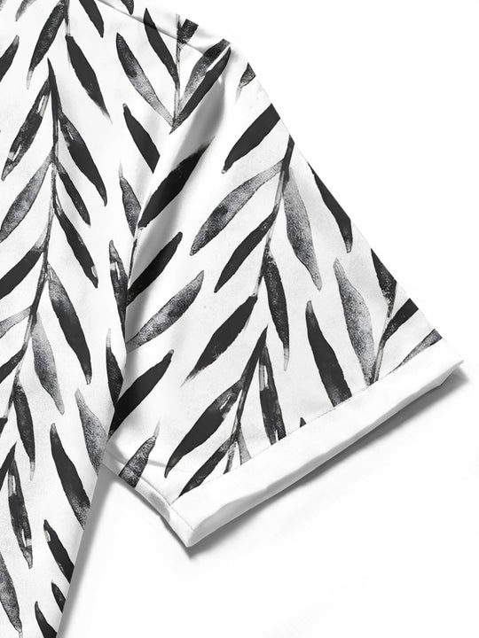 Men's leaf print short sleeve shirt close-up detail view