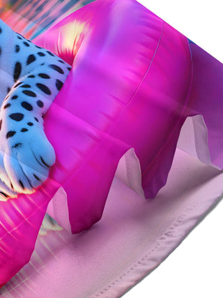 Women's short sleeve shirt close-up detail of snow leopard and pink float pattern
