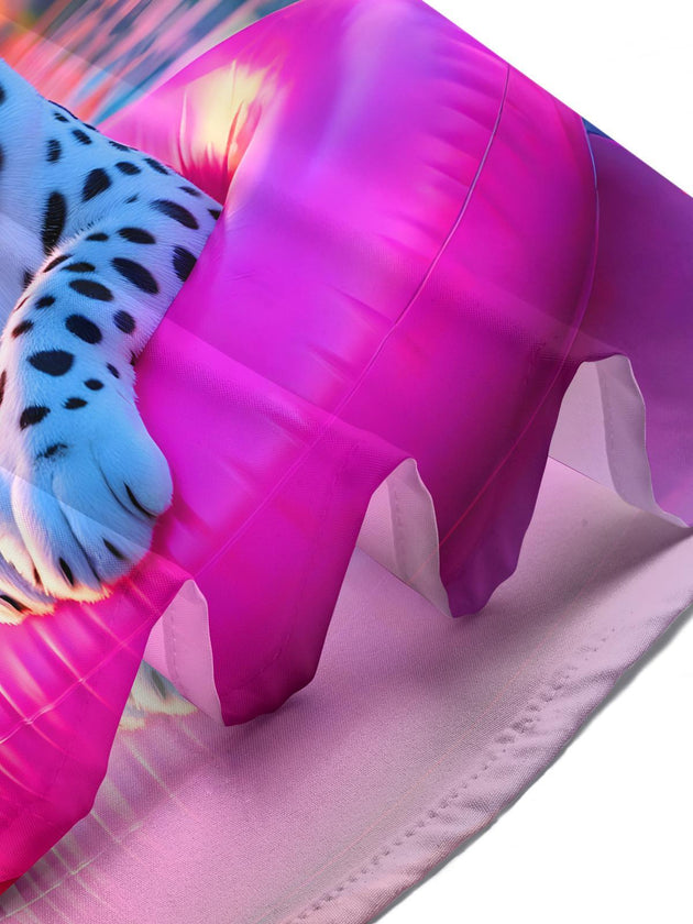 Women's short sleeve shirt close-up detail of snow leopard and pink float pattern