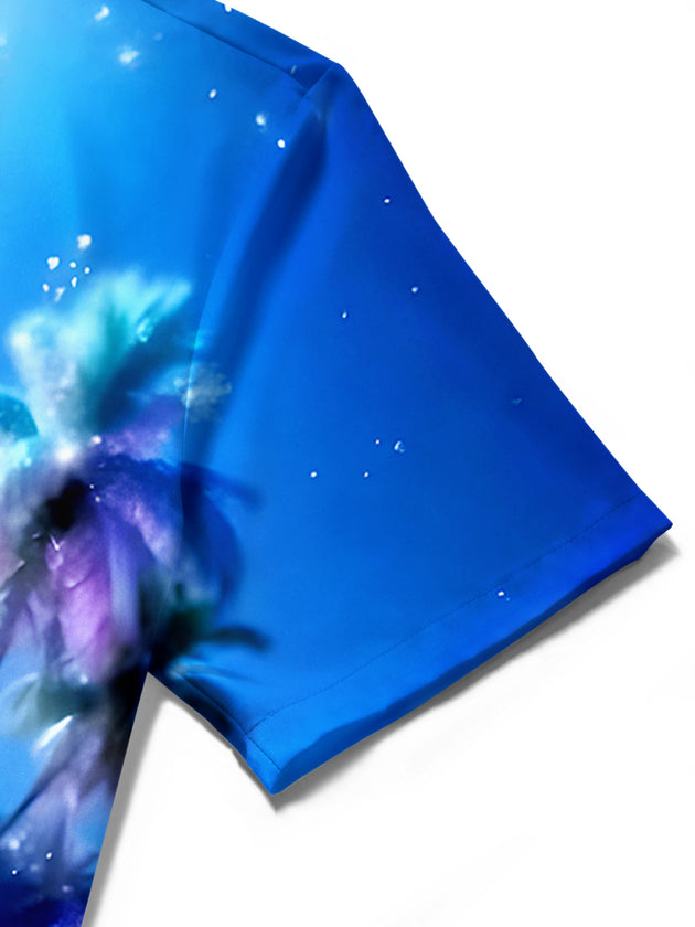 Men's colorful Hawaiian coconut tree print short sleeve shirt close-up detail showing fabric texture and stitching