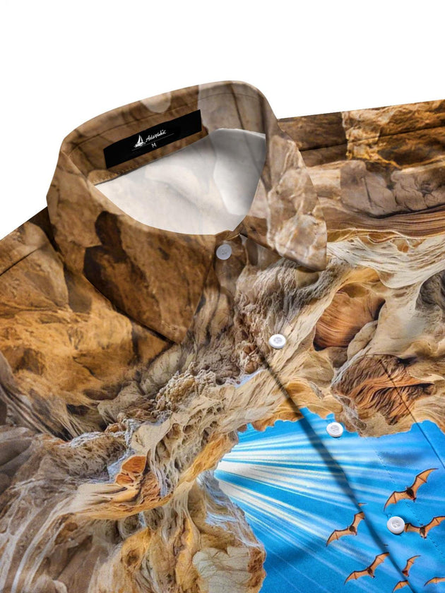 Men's black short sleeve shirt with cave bat print, side view showing pocket detail.