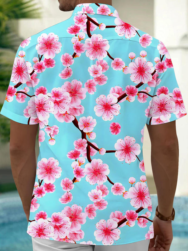 Men's back view of a floral short sleeve shirt in tropical Hawaiian style