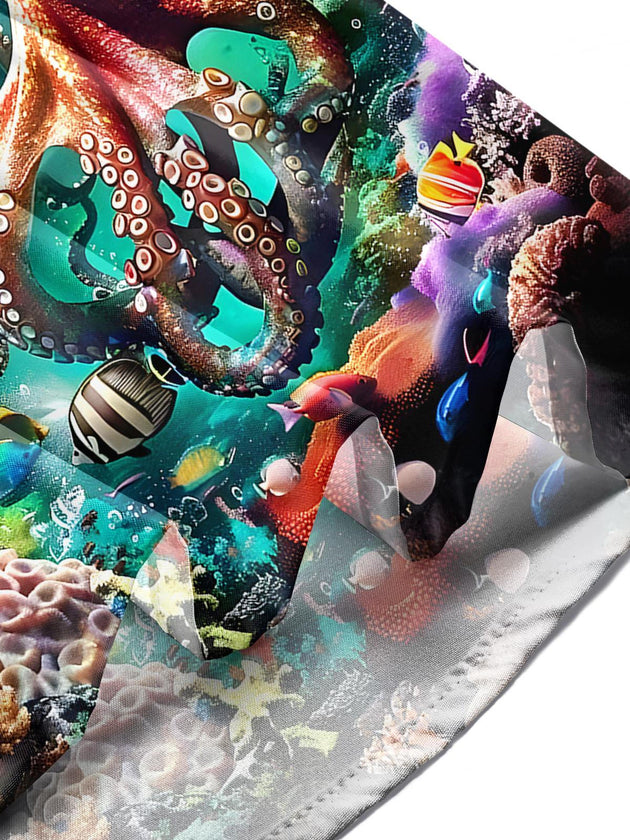 Men's Hawaiian ocean octopus print short sleeve shirt on tropical beach vacation