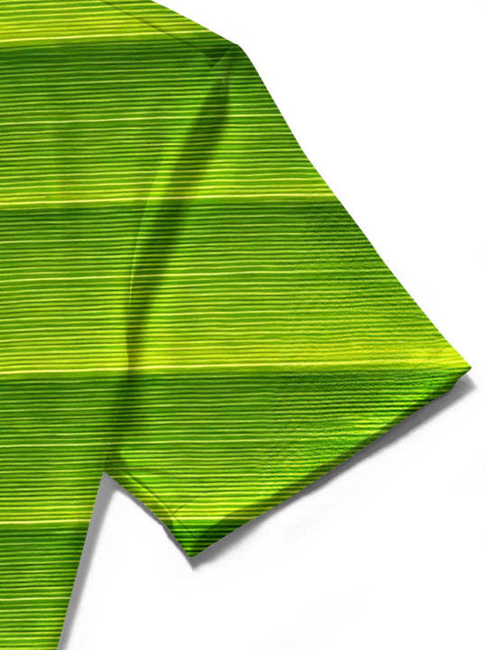 Men's green leaf print short sleeve shirt texture close-up