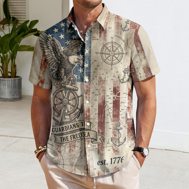 Men's American flag Hawaiian shirt lifestyle shot at a summer pool party, short sleeve tropical vacation top for