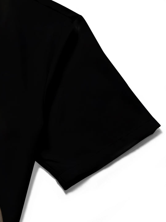 Men's guitar print short sleeve pocket shirt close-up detail of fabric and stitching