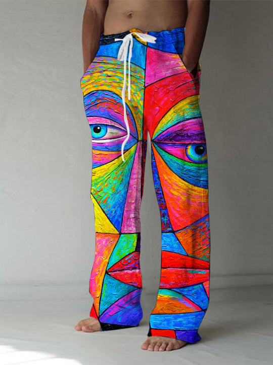 Men's abstract face print casual elastic waist pants front view